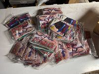 Pile of sealed TriStar Baseball card sets in clear plastic