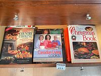 Three cookbooks on shelf
