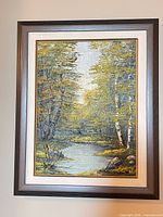 Full view of framed oil landscape painting