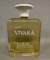 Front view of rectangular glass perfume display bottle with branding visible