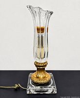 Full view of lamp showing crystal chimney and base