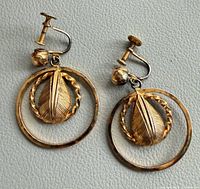 Front view of both gold-tone screw-back earrings