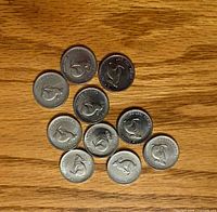 Group of 1967 Canadian 5-cent rabbit coins reverse side visible