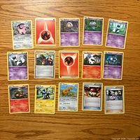 Front of all 15 Pokémon TCG cards laid out