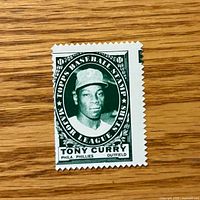 Front of Tony Curry 1961 Topps Baseball Stamp showing image and text