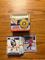 Opened 1990 Score Young SuperStars box with two visible stacks of cards, front cards Eric Lindros and Pierre Turgeon
