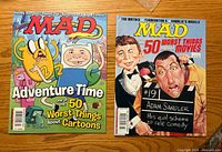 Front covers of both MAD magazines