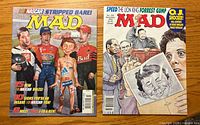 Front covers of both MAD magazines
