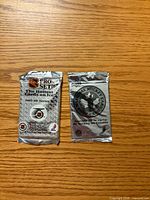 Front view of both sealed hockey card packs