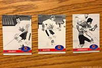 Fronts of three 1972 Summit Series hockey cards featuring Gilbert, Martin, Perreault