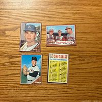 Front view of four 1962 Topps cards
