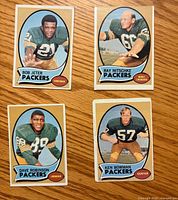 Fronts of four 1970 Topps Packers cards