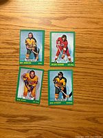 Fronts of four 1973-74 O-Pee-Chee hockey cards