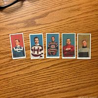 Front view of five C56 reprint hockey cards laid out