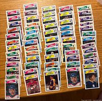 Front view of 63 O-Pee-Chee 1988-89 hockey cards laid out face up