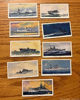 Fronts of nine 1939 Player’s Cigarettes Modern Naval Craft cards showing ship illustrations