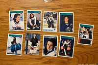Fronts of nine Manon Rhéaume cards laid out on table