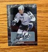 Front of Alexandre Kharitonov autographed card showing signature and design
