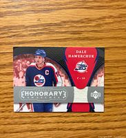 Front of card showing player image, series title and jersey swatch