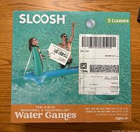 Front of sealed Sloosh Water Games box showing contents and dimensions