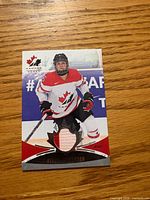 Front of Rebecca Johnston Upper Deck jersey card with red fabric swatch visible