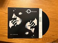 Front cover of Roy Orbison “Mystery Girl” jacket with vinyl and inner sleeve partly visible