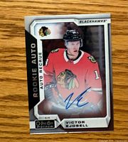 Front of Victor Ejdsell O-Pee-Chee Platinum Rookie Auto card serial 6⁄6 showing autograph