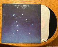 Front cover Willie Nelson Stardust with vinyl partially exposed