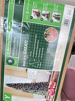 Full box front showing Holiday Time branding, tree image, height and features