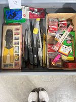 Drawer view showing wire stripper kit, screwdrivers, pliers, boxed wire connectors