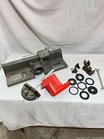 Full lot showing fence assembly, miter gauge, guard, insert rings, wrench and hardware