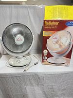 Heater front view alongside original box