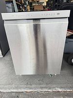 Full frontal view of stainless LG dishwasher