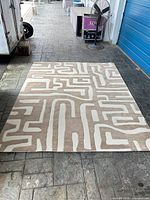 Full view of rug laid flat showing overall pattern