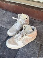 Full pair of sneakers side view