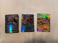 Front view of all three fan-made holographic Pokémon EX cards