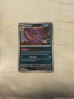 Front of Gengar reverse holo card showing artwork, text, holo pattern and set number 050/088