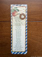 Front view of 1995 Dicksons teacher verse card with attached penny keepsake