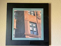 Front view of framed architectural print showing artwork and frame