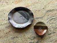 Top view of both ceramic pieces showing size and glaze patterns