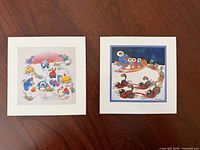 Both square prints side by side on table surface