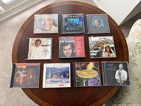 All ten CDs laid out on table showing front covers
