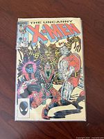 Front cover of The Uncanny X-Men #192 in bag