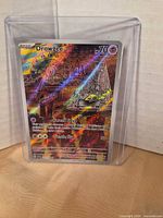 Front view of Drowzee full art secret rare card in toploader
