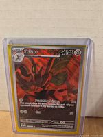 Front view of Scizor foil card in sleeve