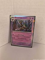 Front view of Trevenant Stage 1 holo card in sleeve