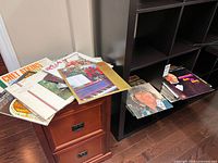Stack of LPs on cabinet and shelving