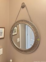 Front view of mirror hanging on wall