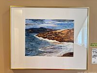 Framed coastline watercolor painting overall view