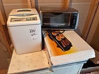 All three appliances together: bread maker, toaster oven, griddle box